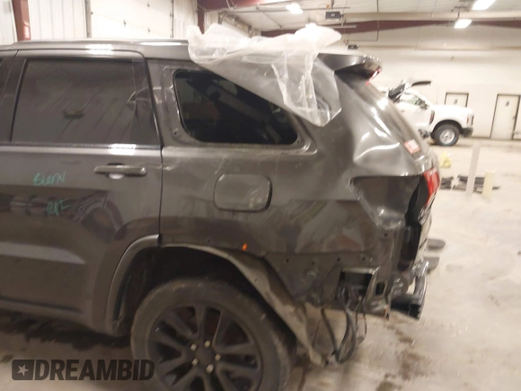 2018 Jeep Grand Cherokee Laredo E with VIN 1C4RJFAG6JC499261, listed as a IAAI auction lot 41033418 with 67,554 mi miles and . Bid and sale history available at DreamBid. Image 6.