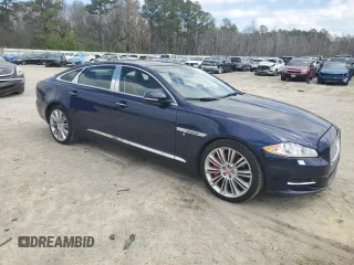 2015 Jaguar XJ Portfolio with VIN SAJWJ2GD8F8V84252, listed as a Copart auction lot 49313935 with 90,545 mi miles and Salvage title. Bid and sale history available at DreamBid. Image 4.