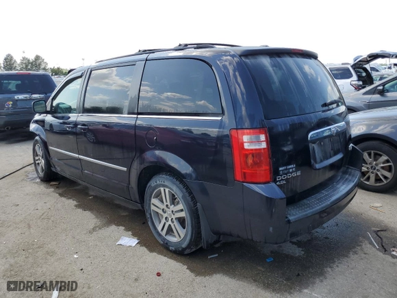 2010 Dodge Grand Caravan SXT with VIN 2D4RN5DXXAR168686, listed as a Copart auction lot 65464994 with 123,340 mi miles and Salvage Title. Bid and sale history available at carsss.com. Image 2.