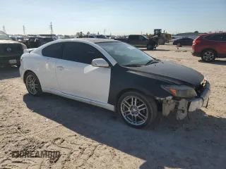 2009 Scion tC with VIN JTKDE167990297899, listed as a Copart auction lot 48591365 with 122,056 mi miles and Salvage Title. Bid and sale history available at carsss.com. Image 4.