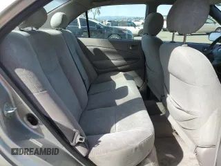 2001 Toyota Prius with VIN JT2BK12U310009326, listed as a Copart auction lot 52003335 with 142,845 mi miles and Salvage Title. Bid and sale history available at carsss.com. Image 10.