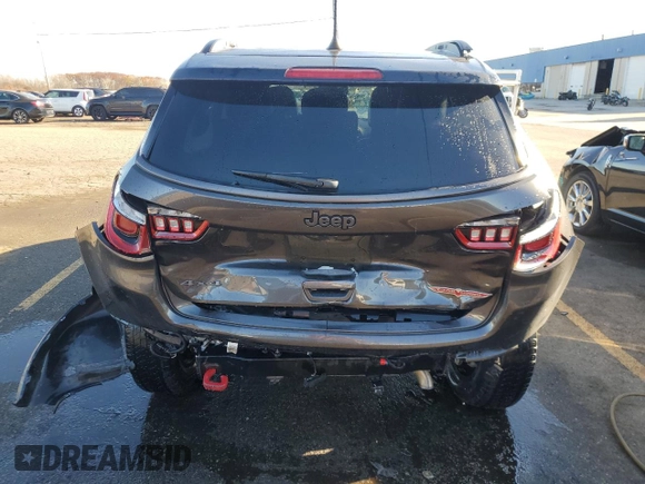 2018 Jeep Compass Trailhawk with VIN 3C4NJDDB4JT192663, listed as a Copart auction lot 79202704 with 73,665 mi miles and Salvage title. Bid and sale history available at DreamBid. Image 6.