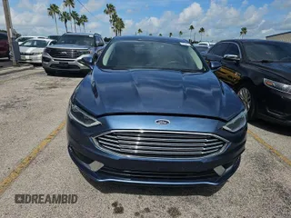 2018 Ford Fusion SE with VIN 3FA6P0HD8JR254222, listed as a IAAI auction lot 42787300 with 136,598 mi miles and . Bid and sale history available at DreamBid. Image 16.