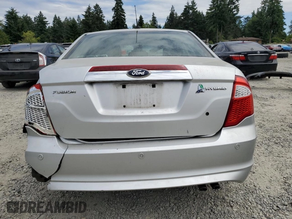 2012 Ford Fusion Hybrid с VIN 3FADP0L30CR284761, выставлен на аукционе Copart как лот 61286445 с пробегом 171 073 миль миль и Списание • Salvage title. История ставок и продаж доступна на DreamBid. Изображение 6.