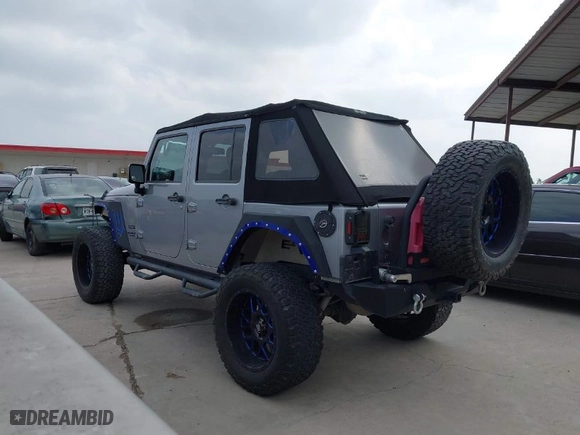 2015 Jeep Wrangler Unlimited Sport with VIN 1C4HJWDG6FL759236, listed as a IAAI auction lot 41932967 with 105,297 mi miles. Bid and sale history available at carsss.com. Image 14.