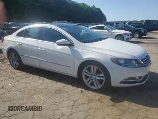 2013 Volkswagen CC Lux with VIN WVWRN7AN6DE568287, listed as a Copart auction lot 59983285 with 157,719 mi miles and Clean title. Bid and sale history available at DreamBid. Image 4.