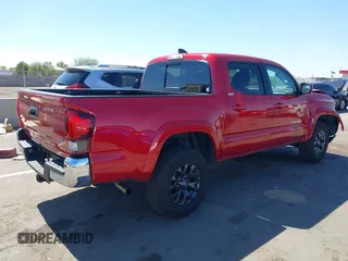 2022 Toyota Tacoma SR5 with VIN 3TMAZ5CN5NM194494, listed as a IAAI auction lot 42555021 with 20,915 mi miles and . Bid and sale history available at DreamBid. Image 4.