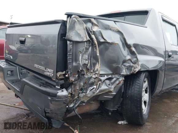 2012 Honda Ridgeline RT with VIN 5FPYK1F24CB456298, listed as a IAAI auction lot 40869948 with 123,329 mi miles and . Bid and sale history available at DreamBid. Image 6.