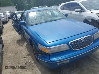 1996 Mercury Grand Marquis LS z VIN 2MELM75W0TX655576, wystawiony jako IAAI lot #42059805 z przebiegiem 46 837 mil mil oraz . Historia ofert i sprzedaży dostępna na DreamBid. Obrazek 1.
