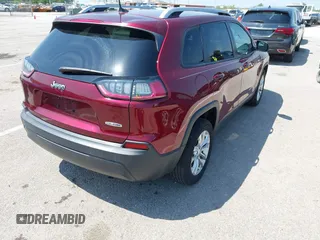 2020 Jeep Cherokee Latitude with VIN 1C4PJLCB4LD615142, listed as a IAAI auction lot 42116038 with 52,250 mi miles and . Bid and sale history available at DreamBid. Image 4.