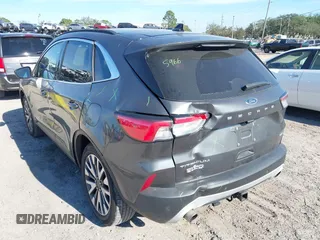 2020 Ford Escape Titanium with VIN 1FMCU9J9XLUA66440, listed as a IAAI auction lot 41464049 with 57,626 mi miles and . Bid and sale history available at DreamBid. Image 6.