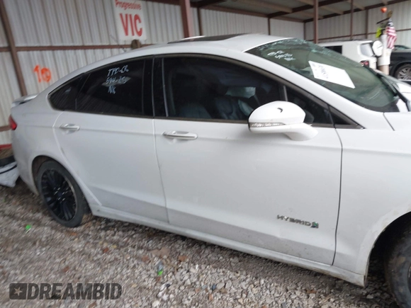 2017 Ford Fusion Hybrid Titanium with VIN 3FA6P0RU1HR322997, listed as a IAAI auction lot 41506630 with 263,589 mi miles and . Bid and sale history available at DreamBid. Image 13.