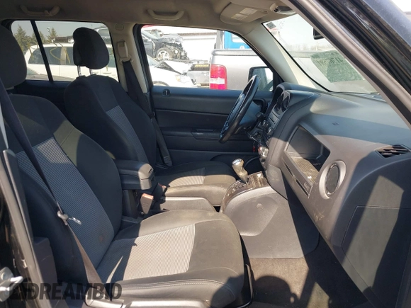 2015 Jeep Patriot Latitude with VIN 1C4NJPFB2FD157907, listed as a IAAI auction lot 41767591 with 111,738 mi miles and . Bid and sale history available at DreamBid. Image 5.