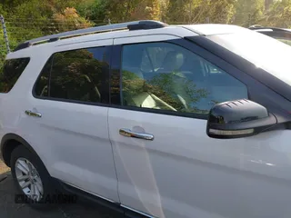 2013 Ford Explorer XLT with VIN 1FM5K7D81DGA97095, listed as a IAAI auction lot 42003091 with 143,148 mi miles. Bid and sale history available at carsss.com. Image 13.