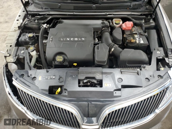 2016 Lincoln MKS с VIN 1LNHL9DK3GG600907, выставлен на аукционе Copart как лот 56892995 с пробегом 122 220 миль миль и Списание • Salvage title. История ставок и продаж доступна на DreamBid. Изображение 11.