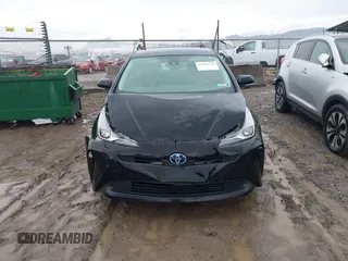 2021 Toyota Prius L Eco with VIN JTDKAMFU5M3145210, listed as a IAAI auction lot 41482234 with 85,600 mi miles and . Bid and sale history available at DreamBid. Image 13.