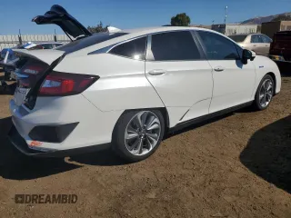 2018 Honda Clarity Plug-In Hybrid with VIN JHMZC5F16JC010946, listed as a Copart auction lot 71469454 with 62,400 mi miles and Salvage Title. Bid and sale history available at carsss.com. Image 3.