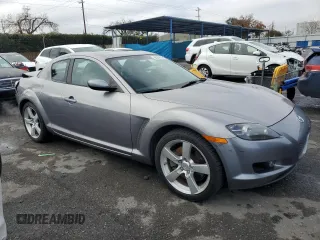 2004 Mazda RX-8 with VIN JM1FE17N740117681, listed as a Copart auction lot 85284094 with 138,555 mi miles and Salvage Title. Bid and sale history available at carsss.com. Image 4.