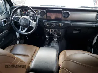 2021 Jeep Wrangler Unlimited Sahara с VIN 1C4JJXP62MW677073, выставлен на аукционе Copart как лот 61348075 с пробегом Не указан миль и Списание • Salvage title. История ставок и продаж доступна на DreamBid. Изображение 8.