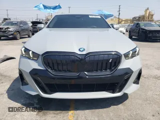 2024 BMW i5 eDrive40 with VIN WBY33FK09RCR17369, listed as a Copart auction lot 65018825 with 3,853 mi miles and Clean title. Bid and sale history available at DreamBid. Image 5.