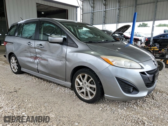 2012 Mazda 5 Touring z VIN JM1CW2CL6C0143536, wystawiony jako Copart lot #57579915 z przebiegiem 148 191 mil mil oraz Szkoda całkowita • Salvage title. Historia ofert i sprzedaży dostępna na DreamBid. Obrazek 4.