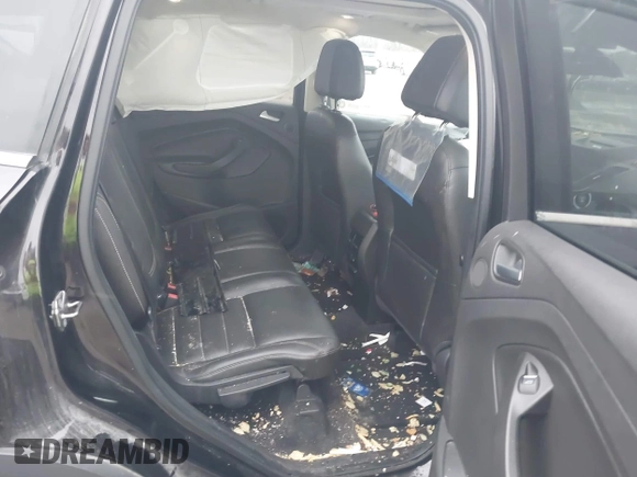2013 Ford Escape SEL with VIN 1FMCU9H95DUC64995, listed as a IAAI auction lot 40821020 with 120,114 mi miles. Bid and sale history available at carsss.com. Image 8.