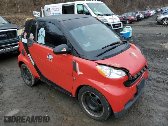 2012 Smart fortwo Pure z VIN WMEEJ3BA2CK571073, wystawiony jako Copart lot #51215135 z przebiegiem 78 686 mil mil oraz Szkoda całkowita • Salvage title. Historia ofert i sprzedaży dostępna na DreamBid. Obrazek 4.