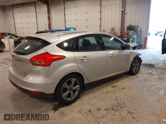 2016 Ford Focus SE with VIN 1FADP3KE2GL377824, listed as a IAAI auction lot 41461648 with 112,038 mi miles and . Bid and sale history available at carsss.com. Image 4.