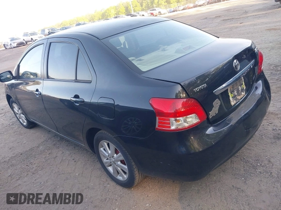 2009 Toyota Yaris with VIN JTDBT903894044347, listed as a IAAI auction lot 42069061 with 197,348 mi miles. Bid and sale history available at carsss.com. Image 3.