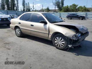 1997 Geo Prizm LSi z VIN 1Y1SK5263VZ408119, wystawiony jako Copart lot #52308235 z przebiegiem 344 971 mil mil oraz Szkody całkowita. Historia ofert i sprzedaży dostępna na DreamBid. Obrazek 4.