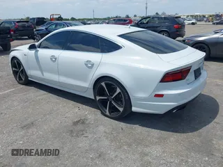 2016 Audi A7 3.0 Prestige with VIN WAU2GAFCXGN102993, listed as a IAAI auction lot 42099259 with 64,490 mi miles. Bid and sale history available at carsss.com. Image 3.