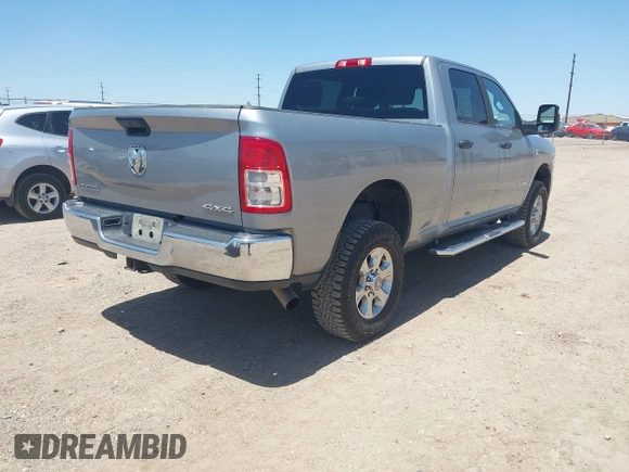 2023 Ram 2500 Big Horn z VIN 3C6UR5DL1PG654074, wystawiony jako IAAI lot #42255020 z przebiegiem 67 732 mil mil oraz . Historia ofert i sprzedaży dostępna na DreamBid. Obrazek 4.