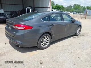 2017 Ford Fusion SE with VIN 3FA6P0HD7HR297945, listed as a IAAI auction lot 42015135 with 136,774 mi miles. Bid and sale history available at carsss.com. Image 4.