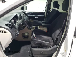 2014 Dodge Grand Caravan SXT z VIN 2C4RDGCGXER138025, wystawiony jako Copart lot #57941985 z przebiegiem 87 055 mil mil oraz Szkody całkowita. Historia ofert i sprzedaży dostępna na DreamBid. Obrazek 7.