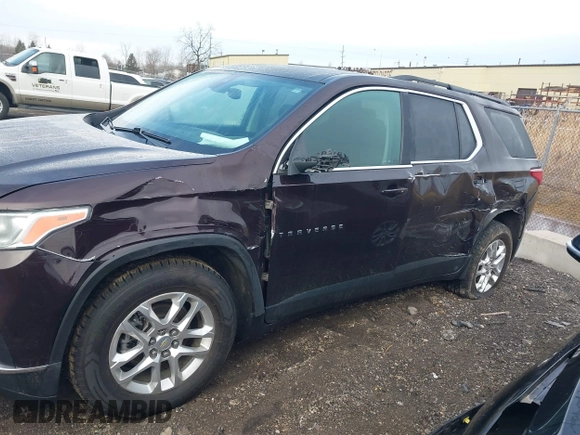 2021 Chevrolet Traverse LT Cloth with VIN 1GNEVGKW2MJ134615, listed as a IAAI auction lot 41667174 with 52,717 mi miles. Bid and sale history available at carsss.com. Image 6.