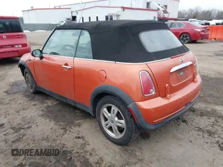2006 MINI Convertible with VIN WMWRF33566TG14606, listed as a IAAI auction lot 41402790 with 177,081 mi miles and . Bid and sale history available at DreamBid. Image 3.