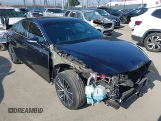 2022 Lexus ES 300h z VIN 58ADA1C11NU021100, wystawiony jako IAAI lot #42074407 z przebiegiem 54 125 mil mil oraz . Historia ofert i sprzedaży dostępna na DreamBid. Obrazek 1.