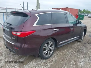2015 Infiniti QX60 with VIN 5N1AL0MM7FC521700, listed as a IAAI auction lot 42310389 with 144,217 mi miles and . Bid and sale history available at DreamBid. Image 4.