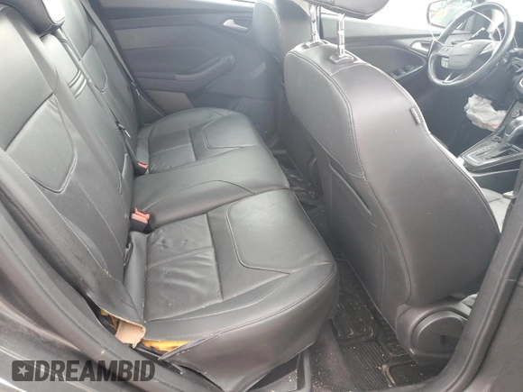 2015 Ford Focus Titanium с VIN 1FADP3J21FL254702, выставлен на аукционе Copart как лот 59872395 с пробегом 93 195 миль миль и Списание • Salvage title. История ставок и продаж доступна на DreamBid. Изображение 10.