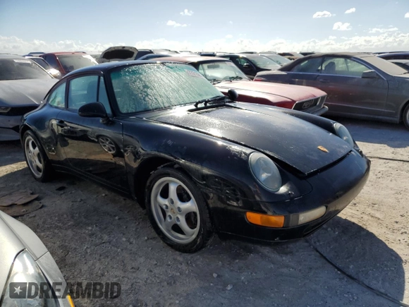 1995 Porsche 911 Carrera with VIN WP0AA2990SS323244, listed as a Copart auction lot 77215074 with 0 mi miles and Non Repairable. Bid and sale history available at carsss.com. Image 4.