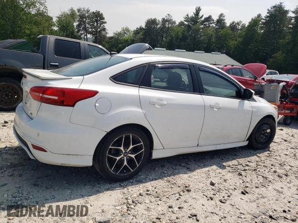2015 Ford Focus SE with VIN 1FADP3F28FL332899, listed as a Copart auction lot 60055185 with 76,948 mi miles and Clean title. Bid and sale history available at DreamBid. Image 3.