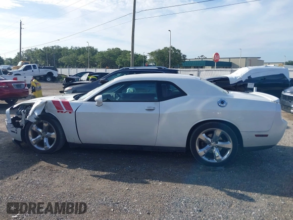 2014 Dodge Challenger R/T with VIN 2C3CDYBT6EH185590, listed as a IAAI auction lot 42536813 with 198,854 mi miles and . Bid and sale history available at DreamBid. Image 14.