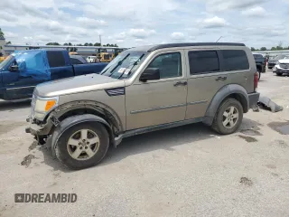 2007 Dodge Nitro SXT z VIN 1D8GT28KX7W596489, wystawiony jako Copart lot #56151355 z przebiegiem 295 949 mil mil oraz Szkoda całkowita • Salvage title. Historia ofert i sprzedaży dostępna na DreamBid. Obrazek 1.