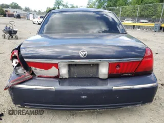 1999 Mercury Grand Marquis LS с VIN 2MEFM75W2XX683074, выставлен на аукционе Copart как лот 55679225 с пробегом 198 956 миль миль и Списание • Salvage title. История ставок и продаж доступна на DreamBid. Изображение 6.