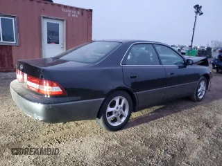 2001 Lexus ES 300 with VIN JT8BF28G010338826, listed as a Copart auction lot 87379074 with Not Provided miles and Salvage Title. Bid and sale history available at DreamBid. Image 3.