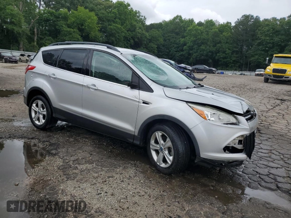 2013 Ford Escape SE with VIN 1FMCU0GX7DUA57262, listed as a Copart auction lot 59088705 with 157,201 mi miles and Salvage title. Bid and sale history available at DreamBid. Image 4.