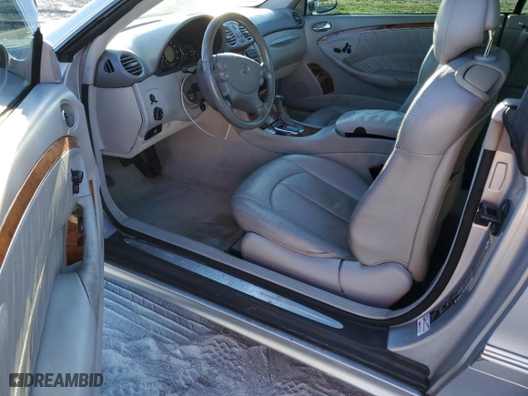 2003 Mercedes-Benz CLK-Class 5.0L with VIN WDBTJ75JX3F052823, listed as a Copart auction lot 87321334 with 132,774 mi miles and Salvage Title. Bid and sale history available at carsss.com. Image 8.