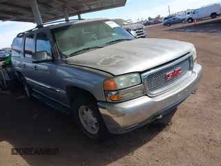 2002 GMC Yukon XL SLT with VIN 1GKFK16Z72J253852, listed as a IAAI auction lot 41606033 with 121,365 mi miles. Bid and sale history available at carsss.com. Image 1.