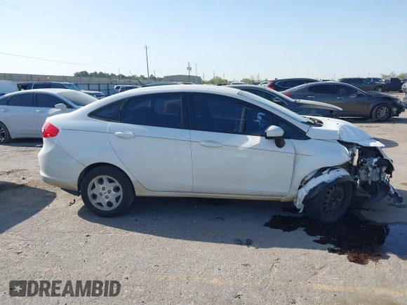 2012 Ford Fiesta SE with VIN 3FADP4BJ0CM207764, listed as a IAAI auction lot 41852699 with 143,287 mi miles. Bid and sale history available at carsss.com. Image 13.
