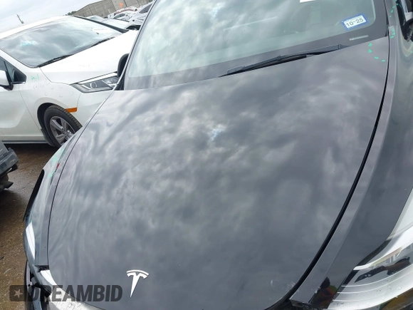 2023 Tesla Model Y Long Range with VIN 7SAYGDEE3PA024315, listed as a IAAI auction lot 41900788 with Not Provided miles. Bid and sale history available at carsss.com. Image 10.